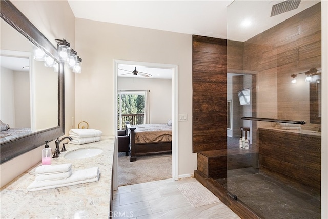 bathroom featuring vanity, walk in shower, tile patterned floors, and ceiling fan