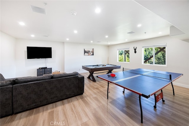 rec room with light hardwood / wood-style flooring and pool table