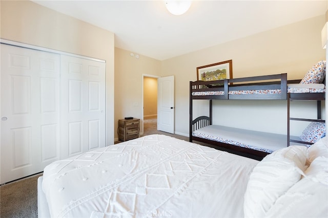 carpeted bedroom with a closet