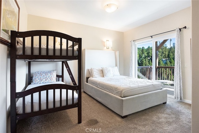 carpeted bedroom featuring access to outside