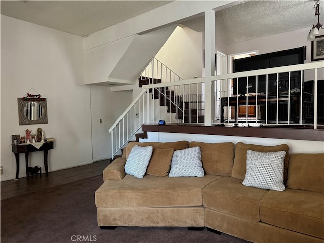 living room with a textured ceiling