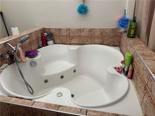 bathroom featuring tiled bath