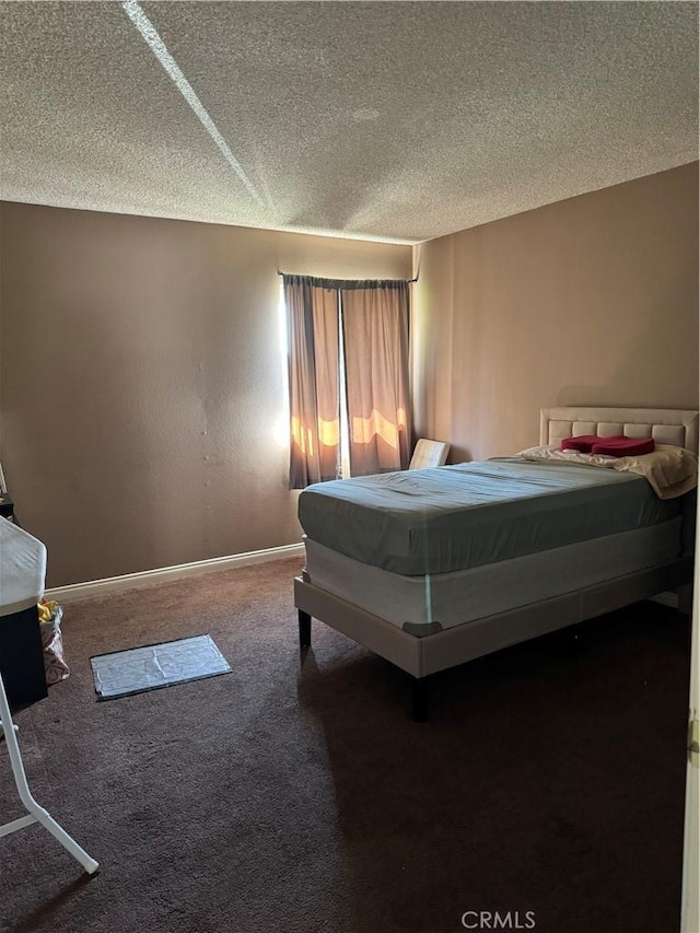 bedroom featuring carpet, a textured ceiling, and pool table