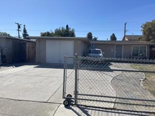 single story home with a garage