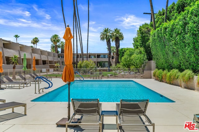 view of pool with a patio area