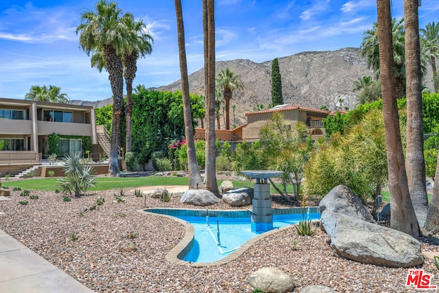 view of pool featuring a mountain view