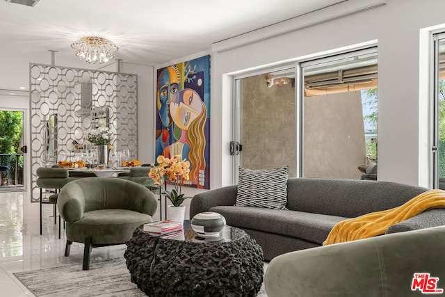 tiled living room with a chandelier