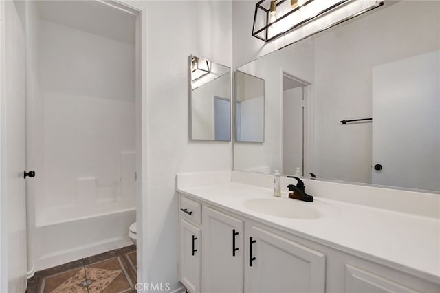 full bathroom with vanity, toilet, and shower / bathing tub combination