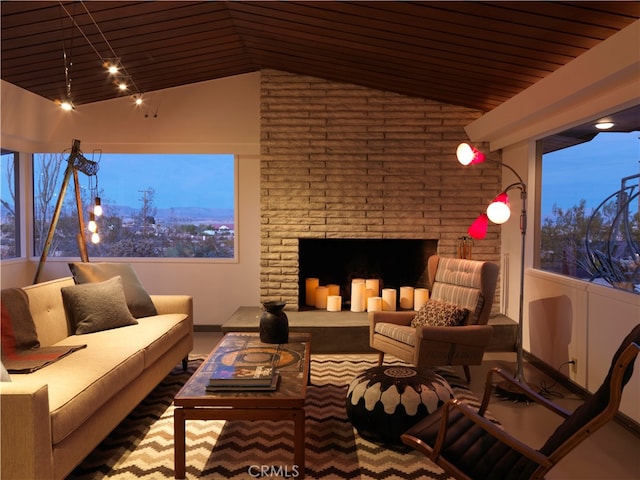 patio terrace at dusk with an outdoor living space with a fireplace