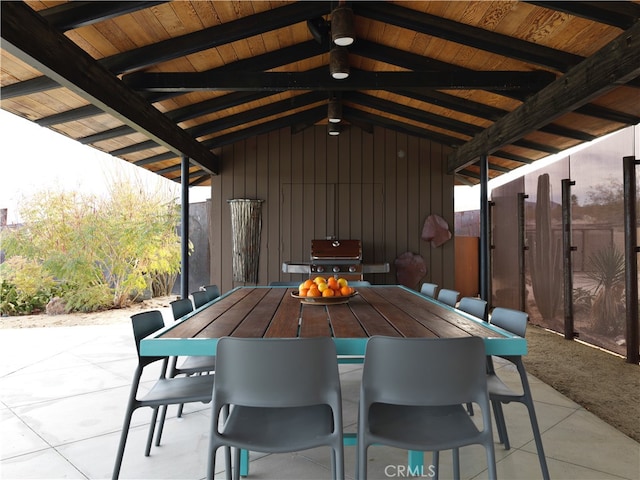 view of patio featuring a grill