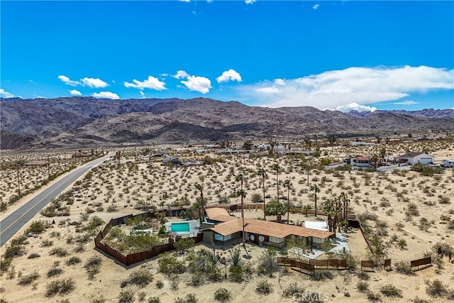 drone / aerial view featuring a mountain view