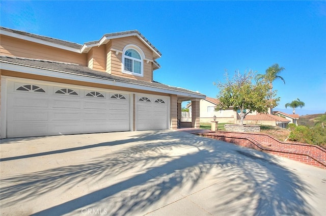 exterior space with a garage