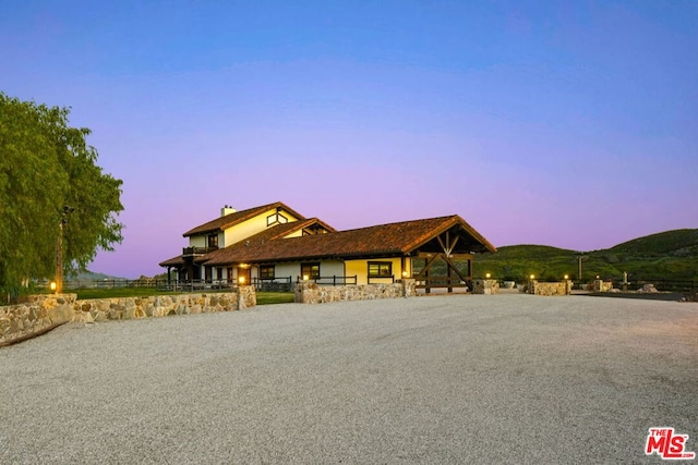 view of front of house with a mountain view