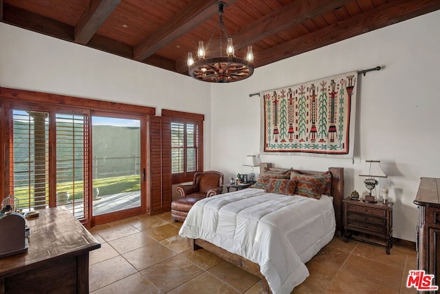 bedroom with an inviting chandelier, beam ceiling, access to exterior, and wooden ceiling