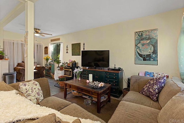 carpeted living room featuring ceiling fan