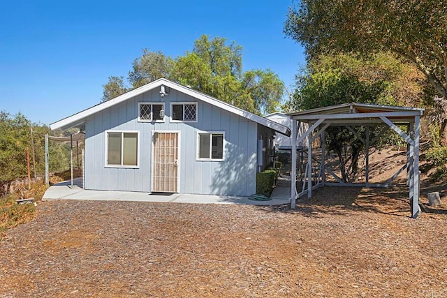 view of outdoor structure with a carport