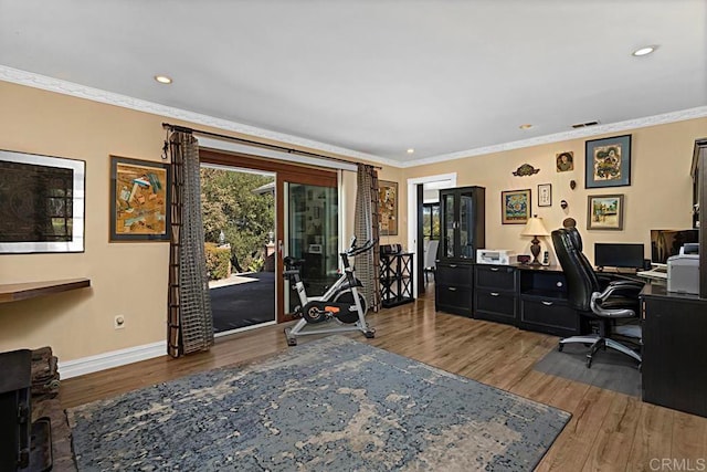 office with crown molding and dark hardwood / wood-style floors