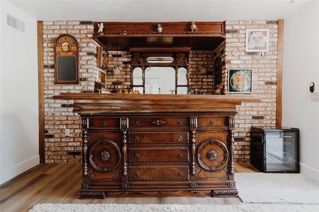 interior details with hardwood / wood-style flooring