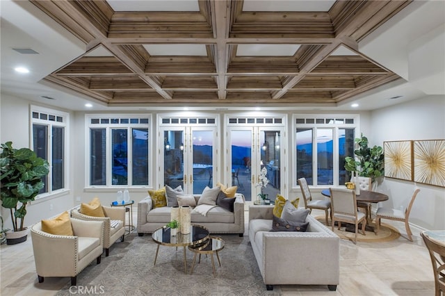 sunroom / solarium with french doors, beamed ceiling, and coffered ceiling