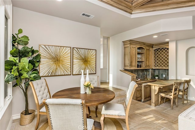 dining room with light tile patterned flooring