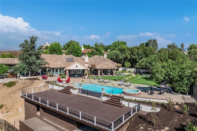 view of pool featuring a patio area