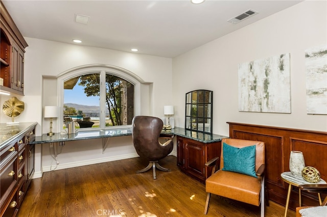 sitting room with dark hardwood / wood-style floors