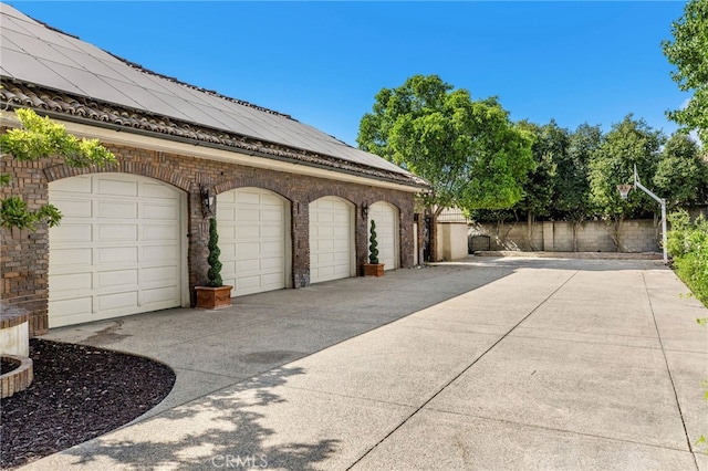 garage featuring solar panels