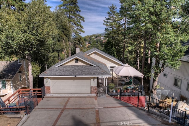 view of front of property with a garage