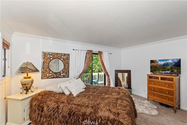 bedroom with access to outside, carpet, and crown molding