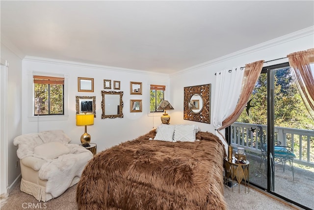 bedroom with access to outside, ornamental molding, and carpet flooring