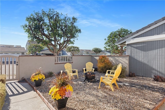 view of patio / terrace featuring a fire pit