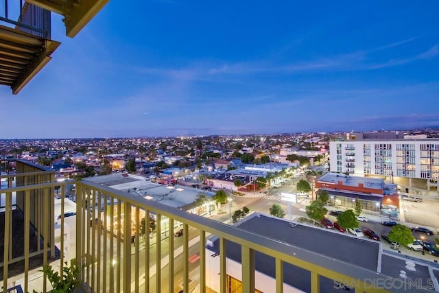 view of balcony at dusk