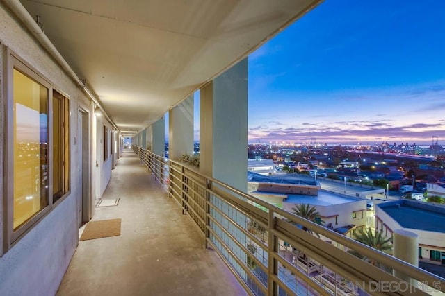 view of balcony at dusk