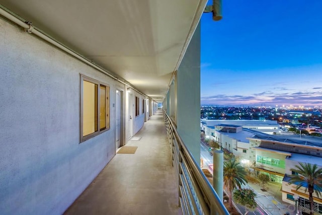 view of balcony at dusk