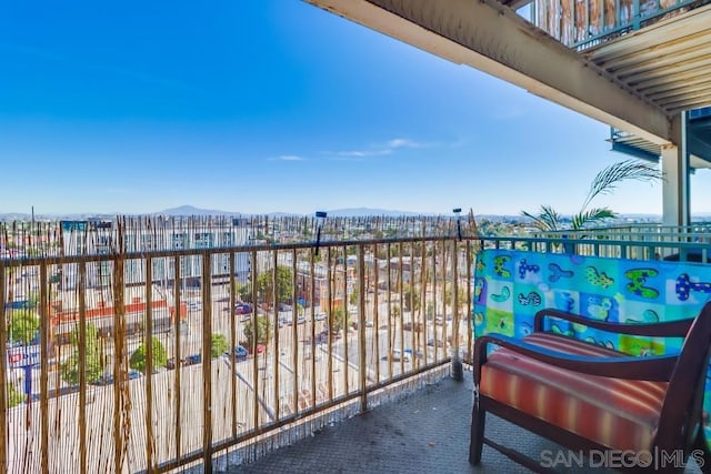 balcony featuring a mountain view