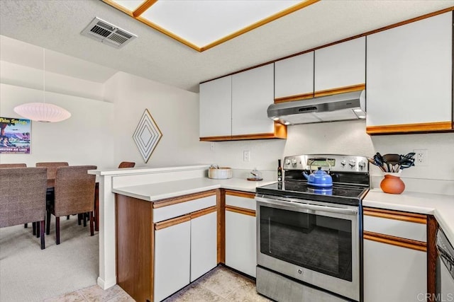 kitchen featuring light carpet, stainless steel electric range, kitchen peninsula, and white cabinetry