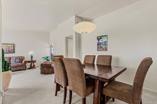 view of carpeted dining area