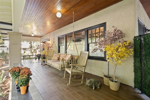 sunroom with wood ceiling