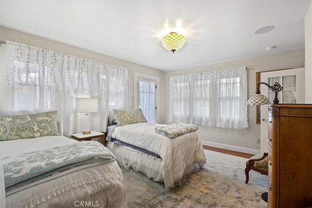 bedroom featuring wood-type flooring