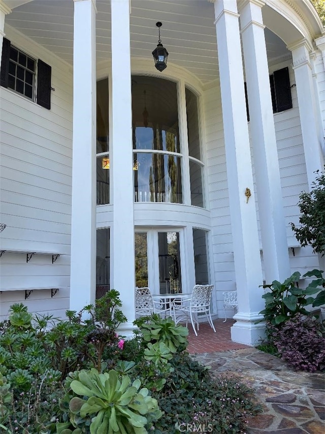 entrance to property with a porch