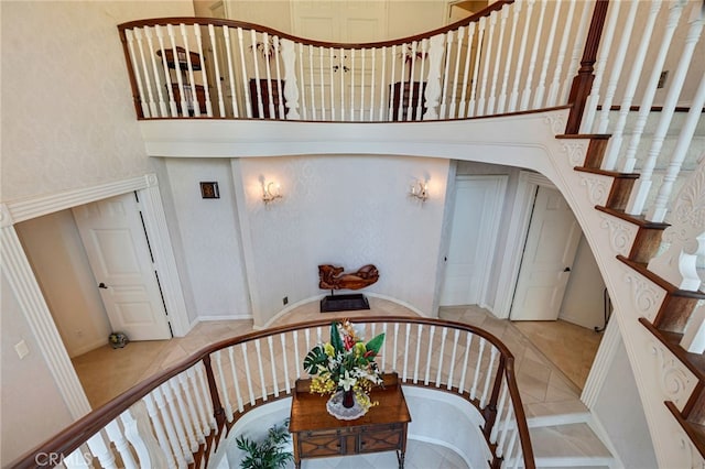 stairway with a high ceiling