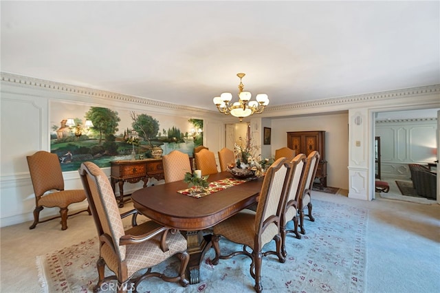 carpeted dining area with an inviting chandelier