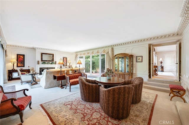 dining room with light carpet and crown molding