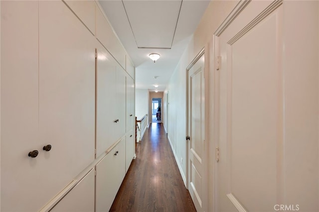 corridor featuring dark hardwood / wood-style floors