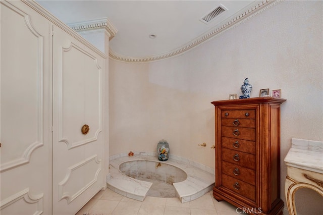 bathroom featuring ornamental molding and tile patterned flooring