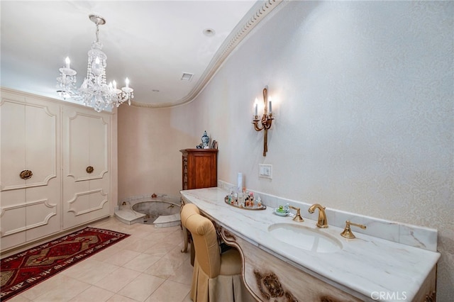 bathroom featuring ornamental molding, tile patterned flooring, a chandelier, and sink