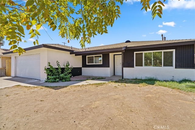 single story home with a garage