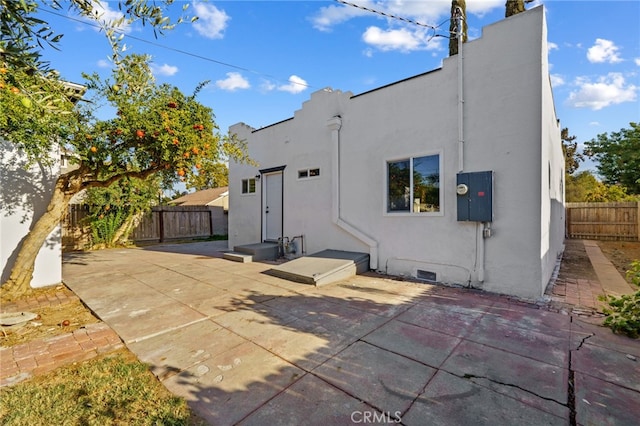 back of house with a patio area