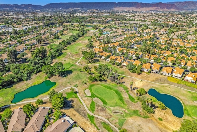 aerial view featuring a water and mountain view