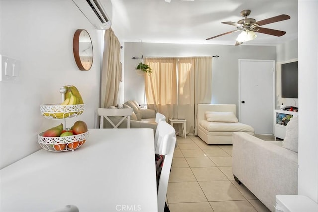 living room featuring light tile patterned floors, a wall mounted AC, and ceiling fan